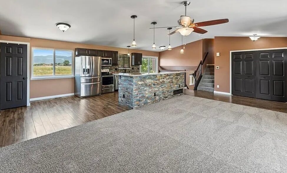 Living room facing kitchen - 7390 Sue Ln