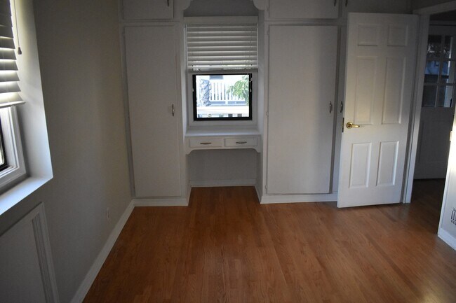Bedroom with Built-In Closets - 1444 S Beverly Dr