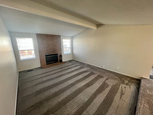 Building Photo - Refreshed Sparks Three Bedroom - Front Landscaping Included