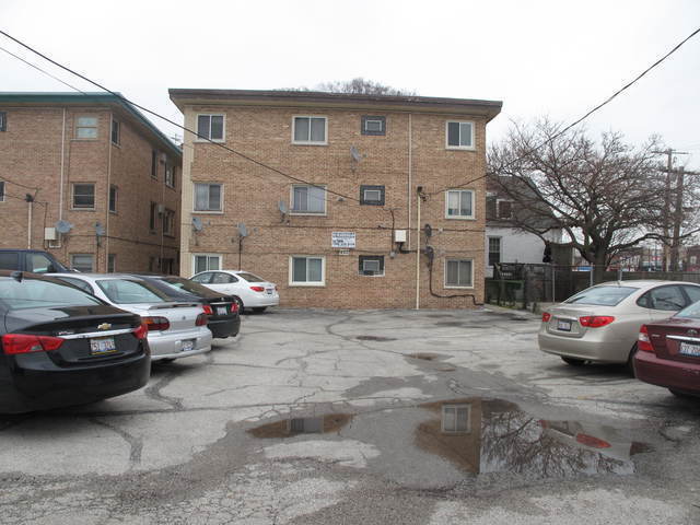 parking/back of building - 820 Austin N Blvd
