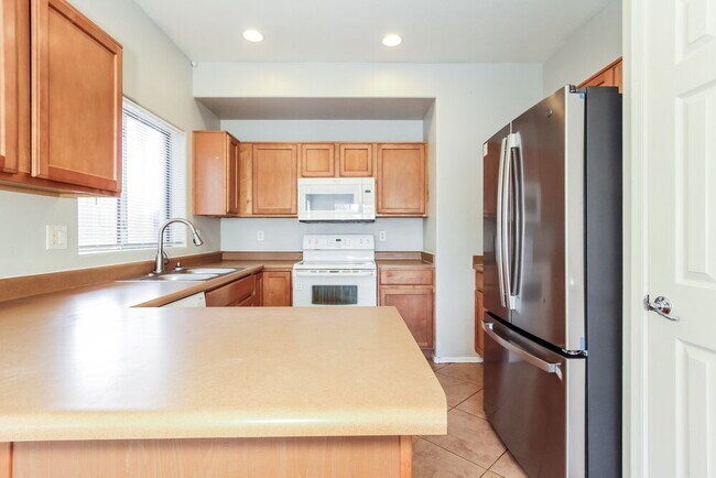 Building Photo - 9021 W Whyman Ave