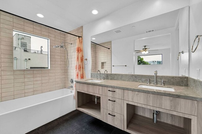 Building Photo - Modern 4-Bed with Rooftop Balcony & Dual Primary Suites