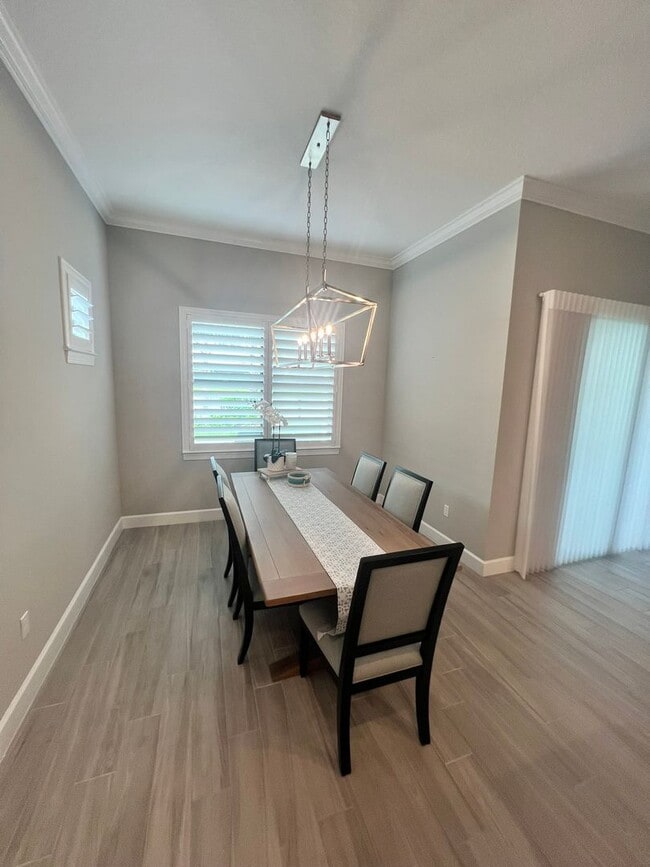 Building Photo - STUNNING LAKEFRONT 3 BEDROOM, 2.5 BATH HOM...