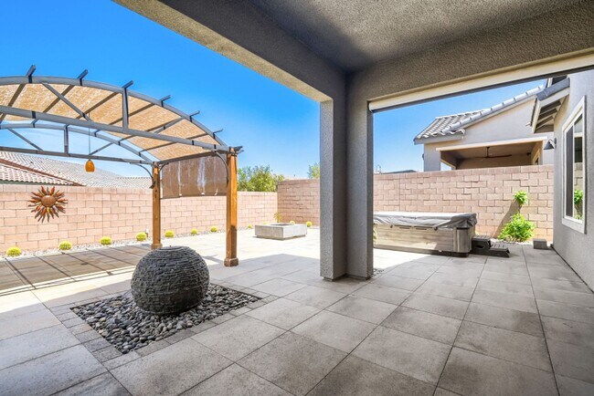 Building Photo - Stunning home with a serene Zen backyard, raised garden beds, fountain and spa!