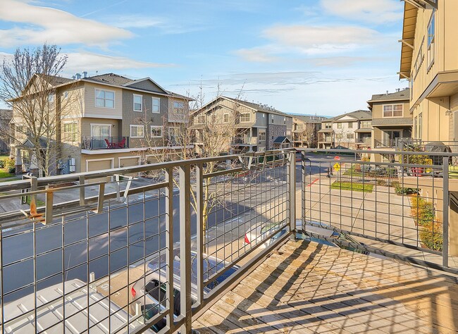 Building Photo - 2BR + 2.1BA Corner Townhome-Style Condo — Dual Primary Suites, Attached Garage & Most Utilities I...
