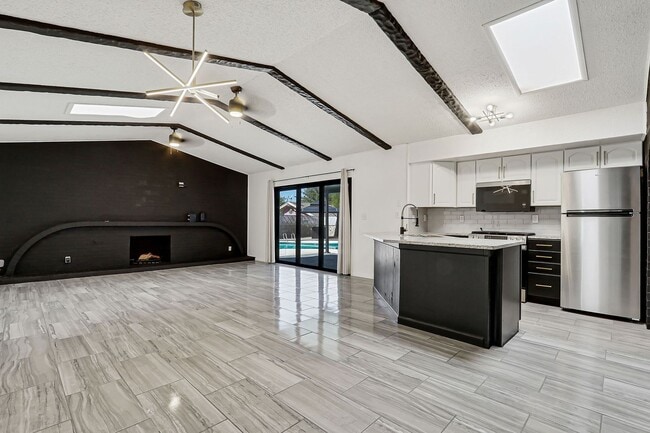 Building Photo - beautiful swimming pool and backyard oasis! fully remodeled home new appliances !