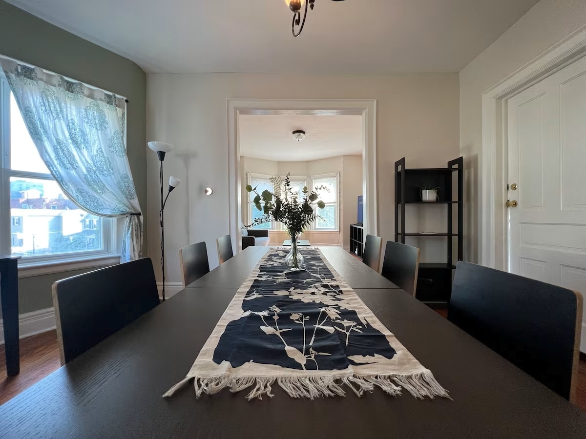 Large dining area that easily fits 6, can accommodate 8 if needed. - 203 W Tupper St