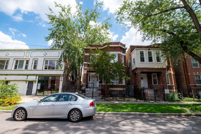 Building Photo - Modern 4BR Apartment with Hardwood Floors, Balcony & Central A/C