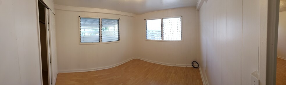 Unit C- View of bedroom #2. Bedroom has it's own closet. *Note- Image is panoramic photo. - 47 -411 Kamehameha Hwy