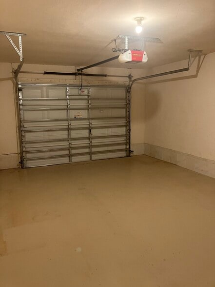Spacious single car garage with extra room for storage - 3222 SW 7th Pl