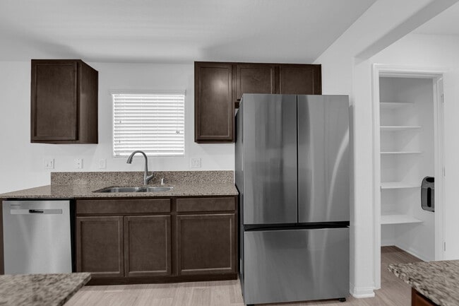 Building Photo - Don't miss out on this cozy 3-bedroom, 2-story home that's ready for you to move in!