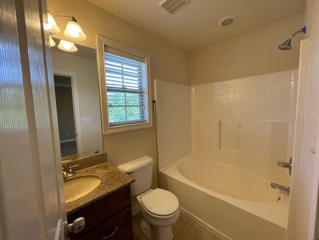 Building Photo - **COMING SOON** NICE 3 BR, 2.5 Bath Townhouse! New Paint & Carpet, Attached Garage, All Electric;
