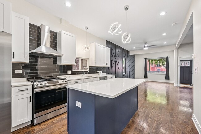 Building Photo - 6547 S Langley Ave