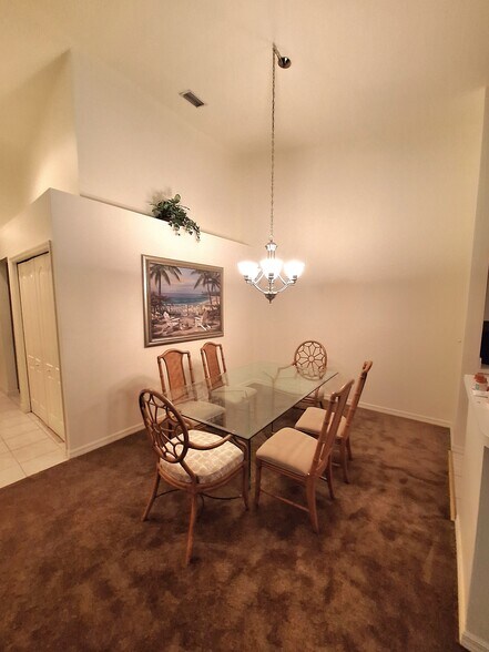 Dining room light dims - 21301 Lancaster Run
