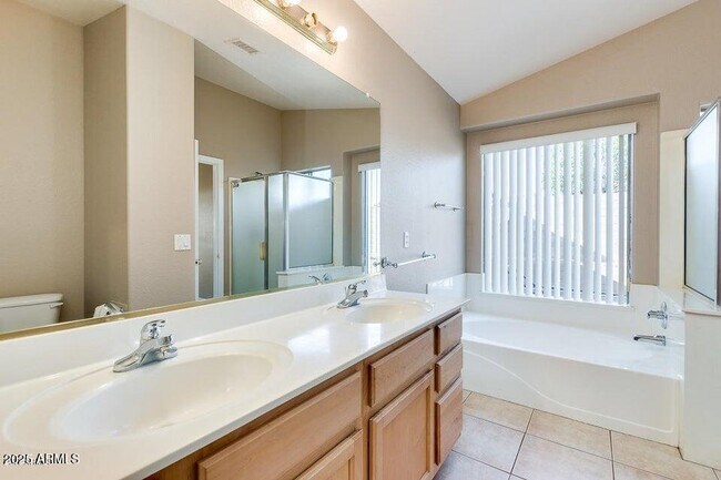 Building Photo - 9346 E Plana Ave