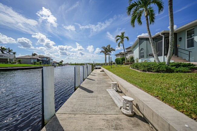 Building Photo - "Waterfront home with Courtyard Pool"