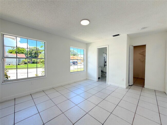 Building Photo - 9850 W Heather Ln