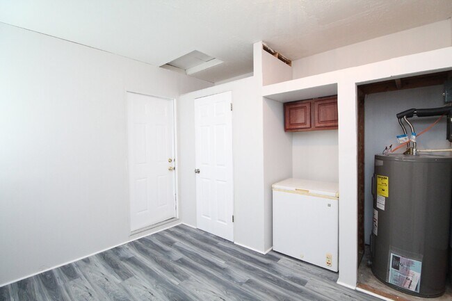 Building Photo - Charming 3-Bedroom Brick Home on Half an A...