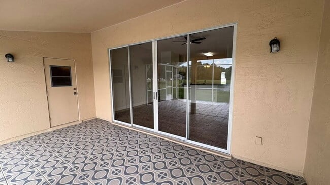 Building Photo - "Stunning 4-Bedroom Lake View Home in Oviedo – Spacious 2,132 Sq Ft Retreat!"