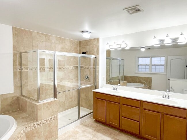 Building Photo - Sizable End Unit Townhome in Wheaton w/ 2 Car Garage!