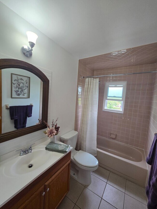 Building Photo - Updates abound at this SPACIOUS, half duplex with 3+ off-street parking spots, 3-bedrooms and 2 f...