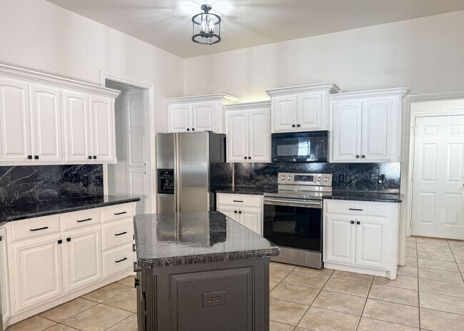 Building Photo - Gated in West Edmond! Storm Shelter! Tons of Space!