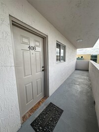 Building Photo - 6091 W 22nd Ct