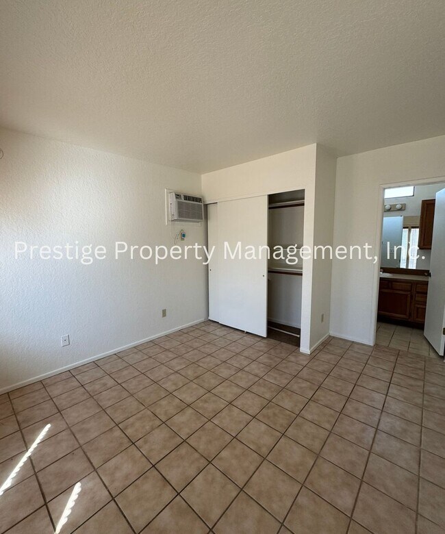 Building Photo - Totaling 3/3 With The Guest House; This Lovely Central Townhome is Everything You Need!