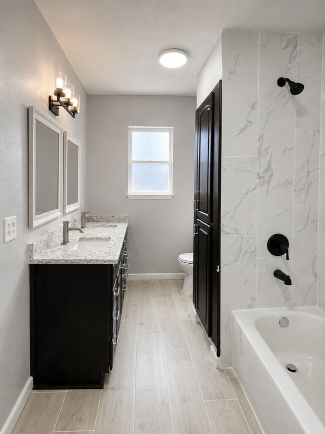 Building Photo - Freshly Renovated Home with HUGE backyard!