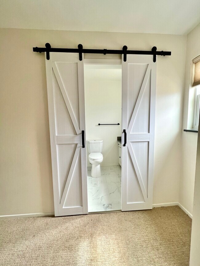 Second Master Bedroom Bathroom Doors - 3268 S Oneida Way