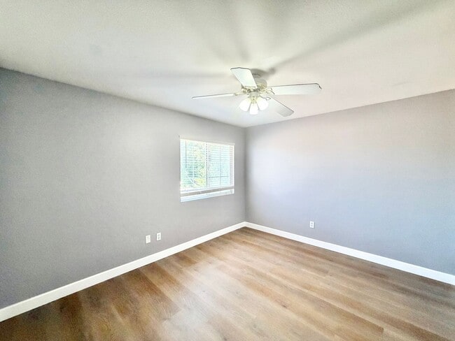 Building Photo - Spacious 5 Bedroom Home with 3 Car Garage & Primary Suite Balcony
