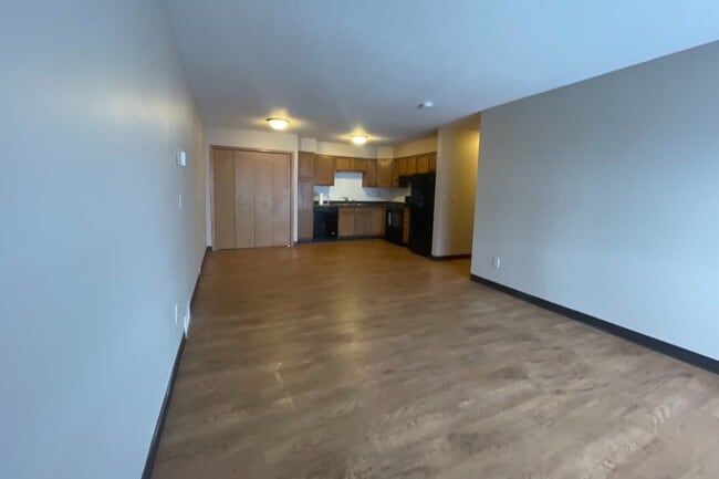One Bedroom Full Living Room/Kitchen View - Crosby Country Apartments