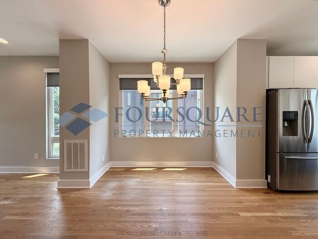 Building Photo - Beautiful  3-Bed / 3.5-Bath End-Unit Townhome with Rooftop Patio, Skyline Views & Climate-Control...