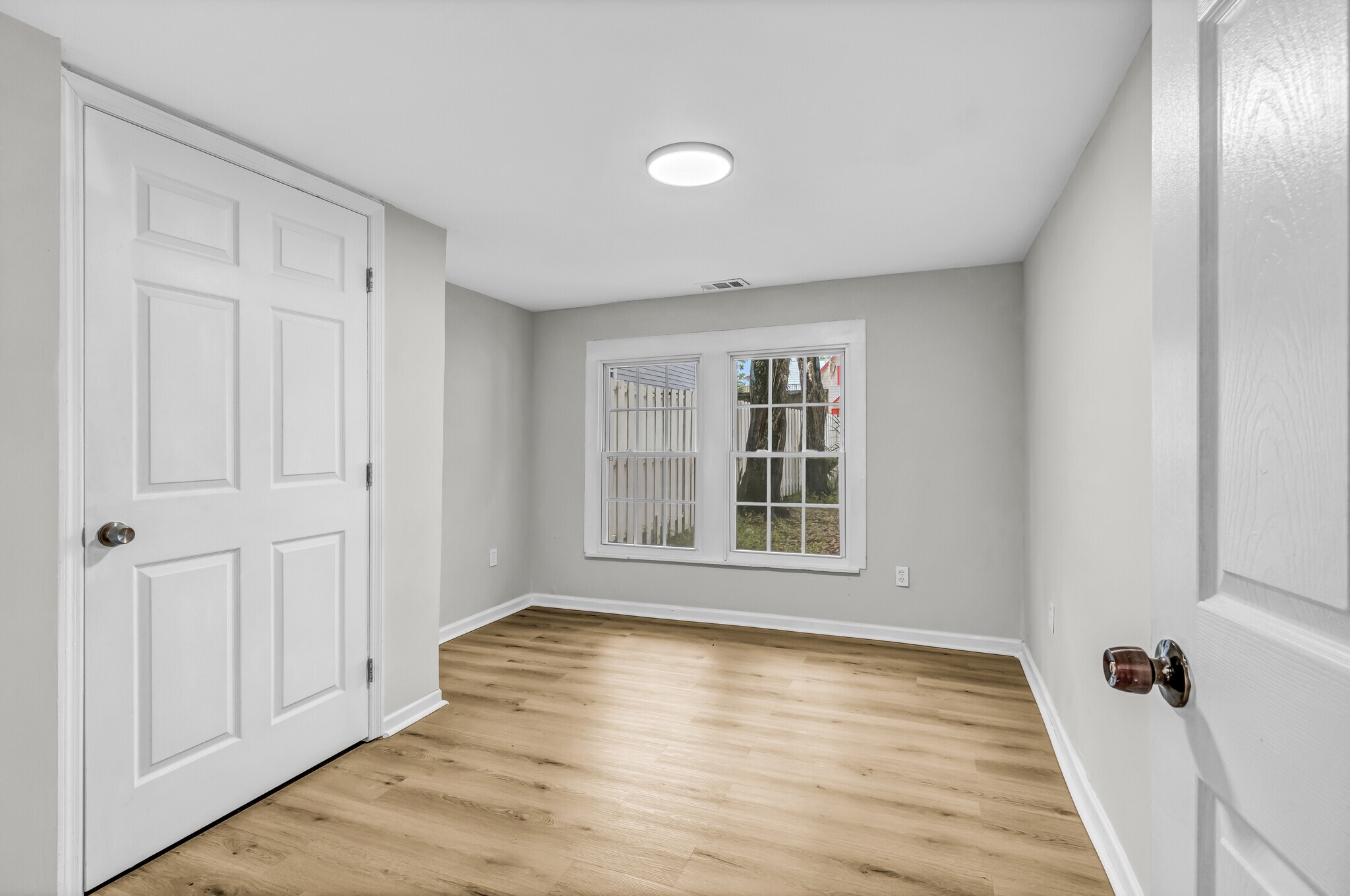 Bedroom #1 with gorgeous natural light would also make a fantastic home office - 844 E 37th St
