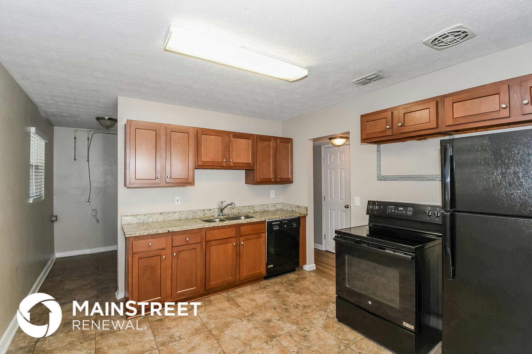 Building Photo - 7147 Eudine Dr N