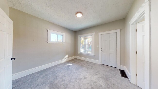 Building Photo - 7408 Dudley Ave