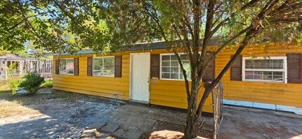 Building Photo - 6250 Flag St