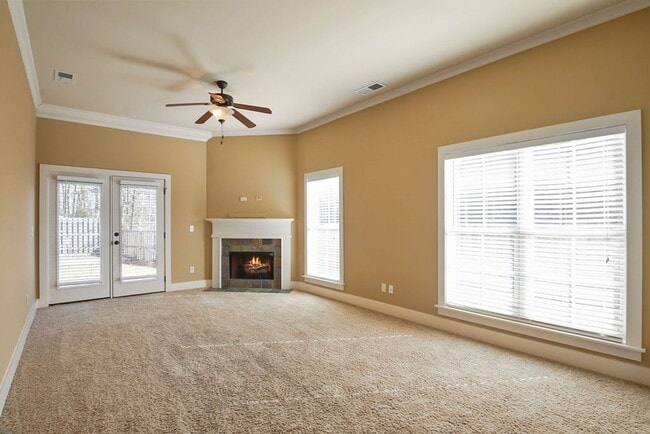 Building Photo - Like-New One-Level Brick Home with Private Patio