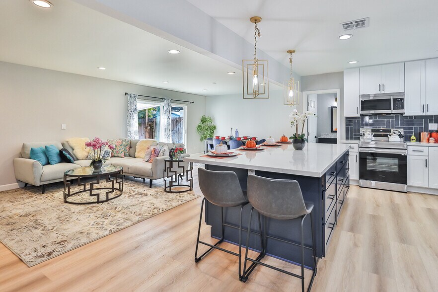 open kitchen living room dining room - 8520 Jumilla Ave