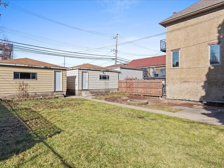 One garage included, the other is available for rent. - 3214 S Throop St