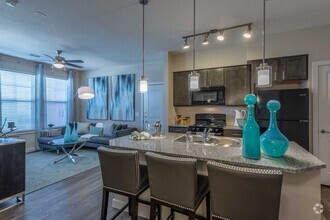 Building Photo - Save Big—Call Now! Get $500 Off Your Rent!