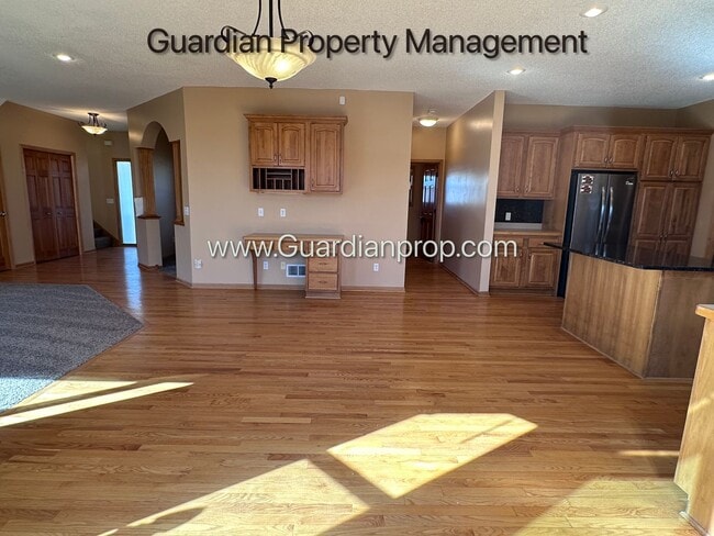 Building Photo - Brooklyn Park Single Family Home, Office, 3 Car Garage, New Carpet, Large Deck, Available Now