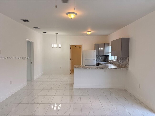 Building Photo - 3027 NW 23rd Ave