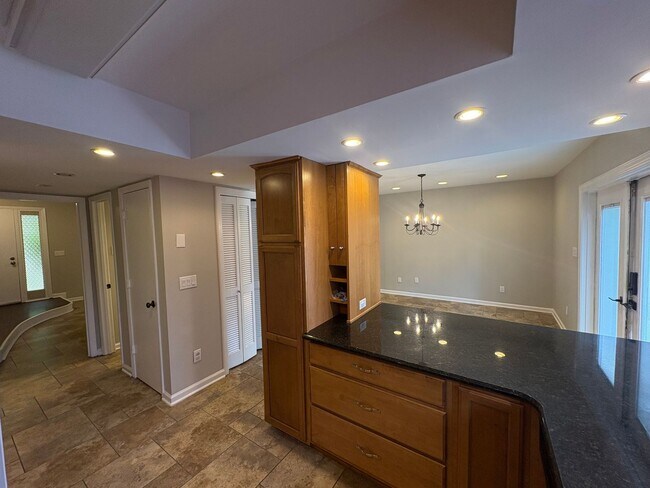 Building Photo - Four Bedroom Townhome Available Now