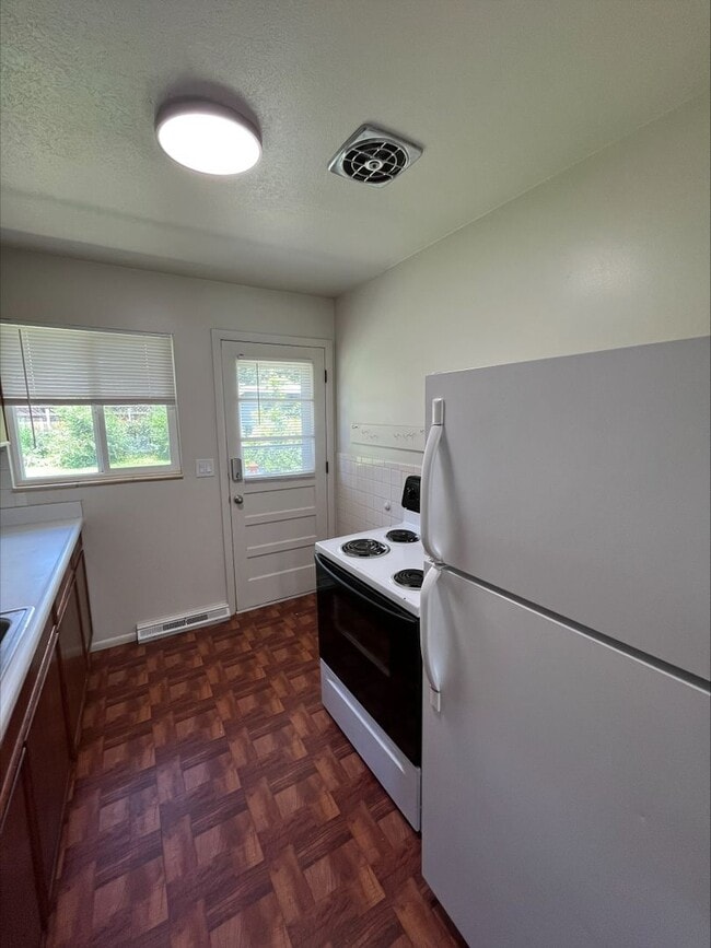 Building Photo - 2-Bedroom Ranch-Style Home in North Boulder Triplex
