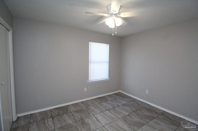 Building Photo - 6810 Tiki Ln