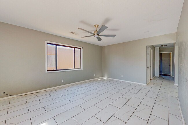 Building Photo - NE PUEBLO STYLE 3 Bedroom 2 Bath 1824/SF
