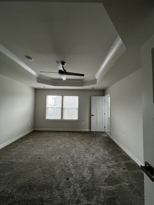 Building Photo - Exceptional 3-Level Corner Unit Townhome w...