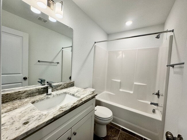 Building Photo - Practically New & Available May 1st! Luxur...