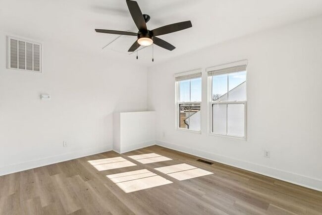 Building Photo - High-End 2BR Townhome | Rooftop Terrace + 2-Car Garage | 24-Unit Community